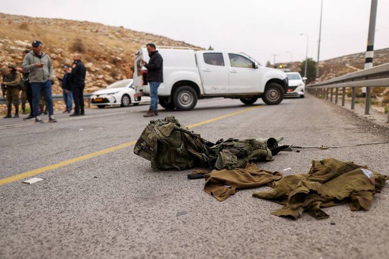 Items belonging to the Israeli soldier at the scene of the attack. Reuters