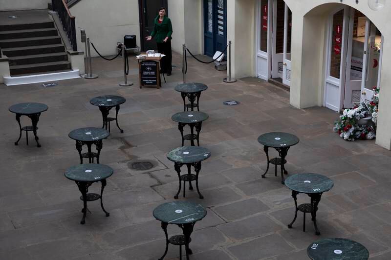 An opera singer sings to an empty piazza in Covent Garden on December 16, 2020. Getty Images