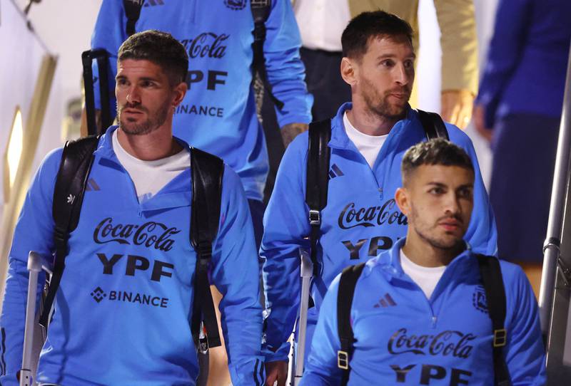 Lionel Messi, top right, and the Argentina squad arrive in Doha following a 5-0 win over UAE in Abu Dhabi. Reuters