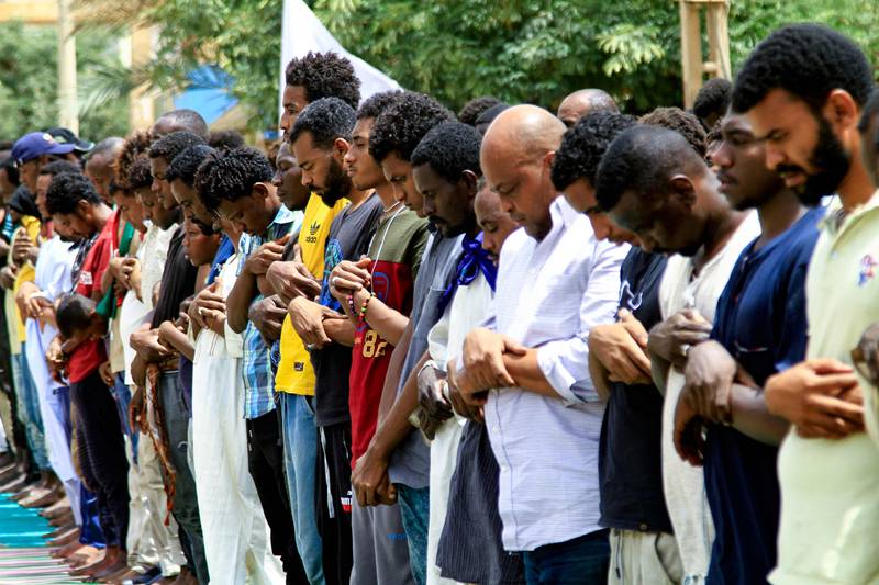 Sudanese demonstrators perform the Friday noon prayers in southern Khartoum. AFP