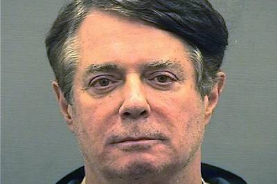 FILE PHOTO:  Former Trump campaign manager Paul Manafort is shown in a jail booking photo taken in Alexandria, Virginia, U.S., July 12, 2018.  Alexandria Sheriff's Office/Handout via REUTERS/File Photo   ATTENTION EDITORS - THIS IMAGE WAS PROVIDED BY A THIRD PARTY. THIS PICTURE WAS PROCESSED BY REUTERS TO ENHANCE QUALITY. AN UNPROCESSED VERSION HAS BEEN PROVIDED SEPARATELY.