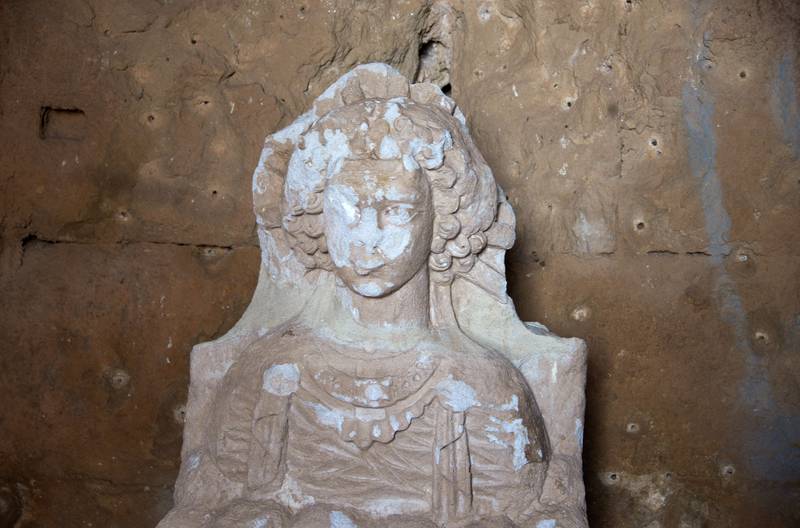 A statue in Hatra. ISIL extremists in 2015 released footage of their destruction of artefacts in which they took guns and pick axes to the once extensive remains of what was one of the leading trade centres between the Roman and Parthian empires in the first and second centuries AD. AFP