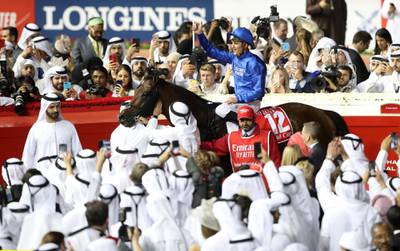 Christophe Soumillon celebrates winning the Dubai World Cup. Reuters