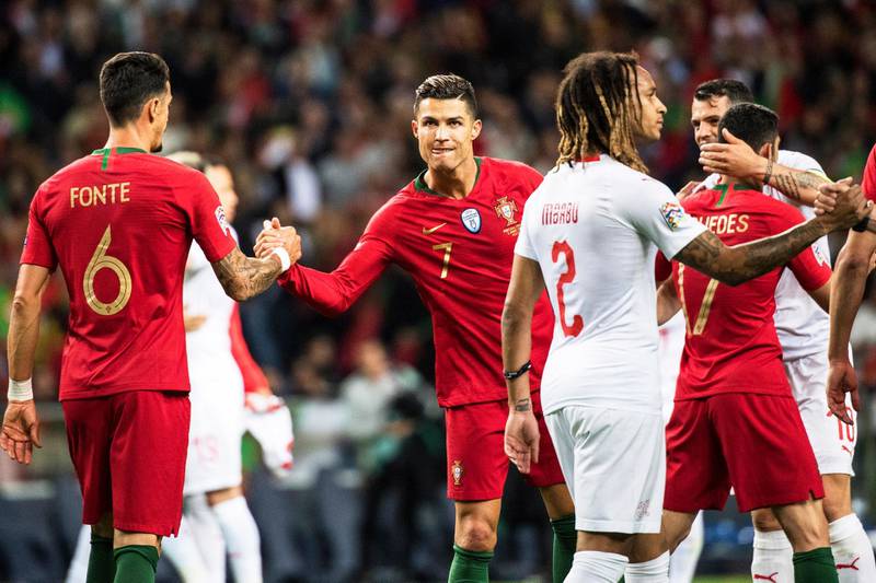 Ronaldo shakes hands with his teammate Jose Fonte at the final whistle. EPA