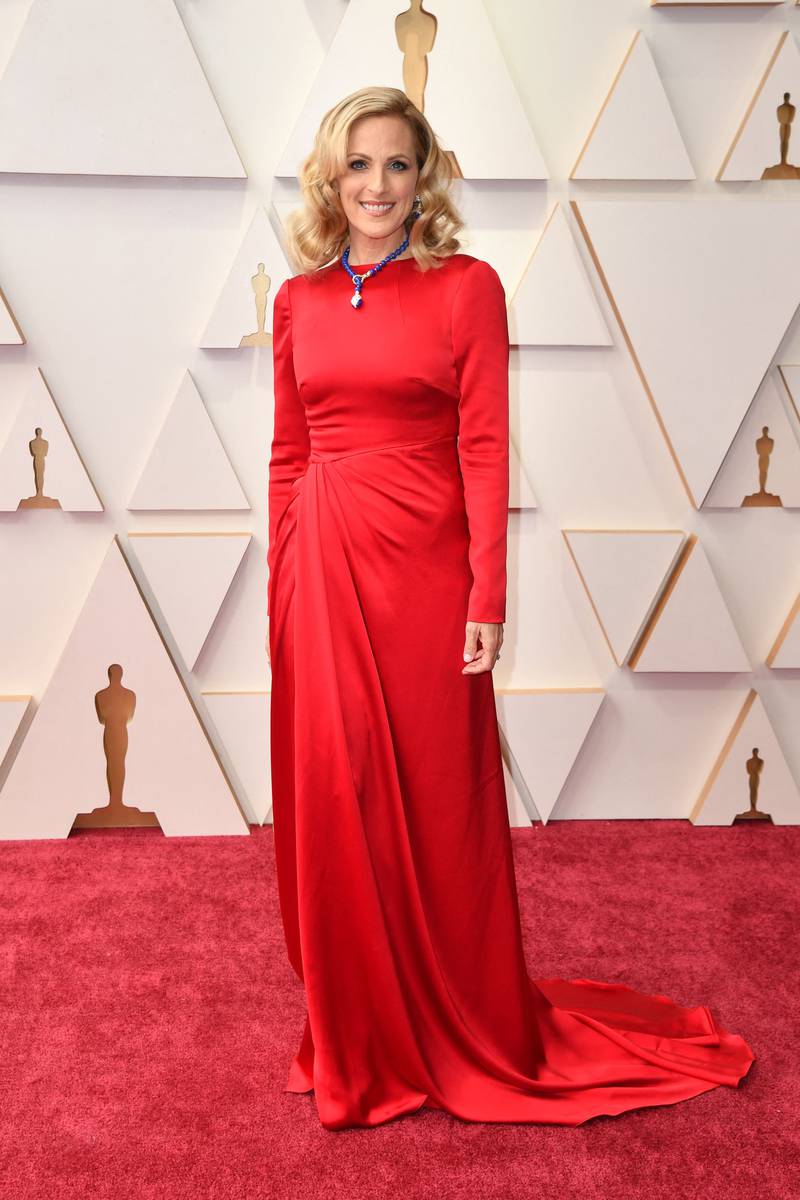 Marlee Matlin, wearing a red silk gown. AFP