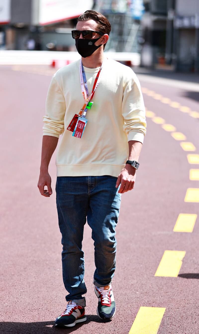 Tom Holland, in a cream jumper, jeans and New Balance trainers, attends the Formula One Grand Prix of Monaco on May 23, 2021 in Monte-Carlo. Getty Images