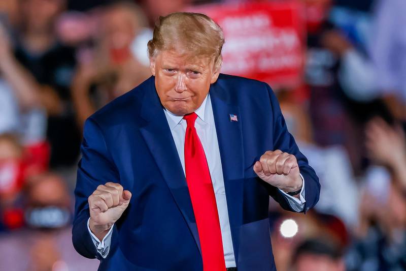 US President Donald J. Trump dances after speaking during his Make America Great Again Rally campaign event at Middle Georgia Regional Airport. EPA