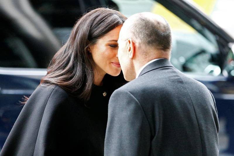 Meghan rubs noses with New Zealand High Commissioner Sir Jerry Mateparae. Reuters