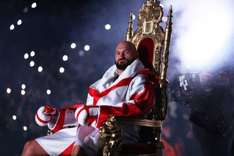 Tyson Fury sits on a throne during his ring walk to face Dillian Whyte at Wembley Stadium. Getty