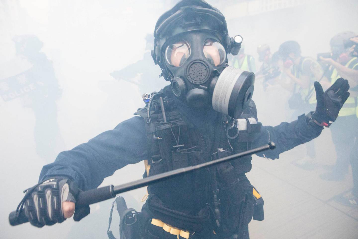 A member of the Hong Kong riot police during clashes in the Mong Kok area of Hong Kong. Rick Findler for The National