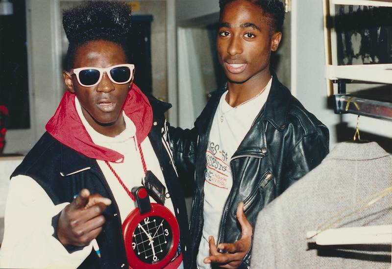 Flavor Flav, with rapper Tupac Shakur, at the 1989 American Music Awards. Getty Images 