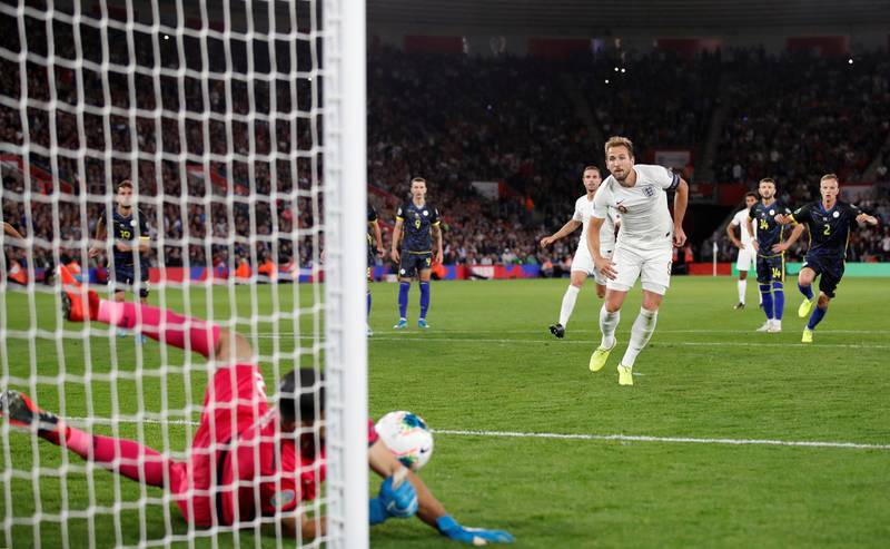 Kosovo's Aro Muric saves a penalty from England's Harry Kane. Reuters
