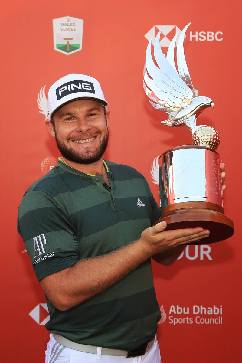 Tyrrell Hatton of England with the trophy following victory at the 2021 Abu Dhabi HSBC Championship at Abu Dhabi Golf Club. Getty