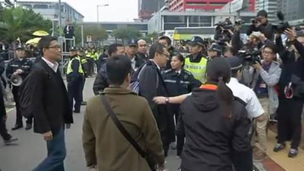 Hong Kong protesters vow to continue movement after police release organisers - video