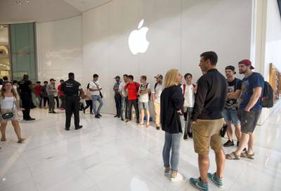 DUBAI, UNITED ARAB EMIRATES, 20 SEPTEMBER 2018 - Crowd waiting in queue to get the new iphone XS at Apple store in Dubai Mall.  Leslie Pableo for The National for Patrick Ryan’s story