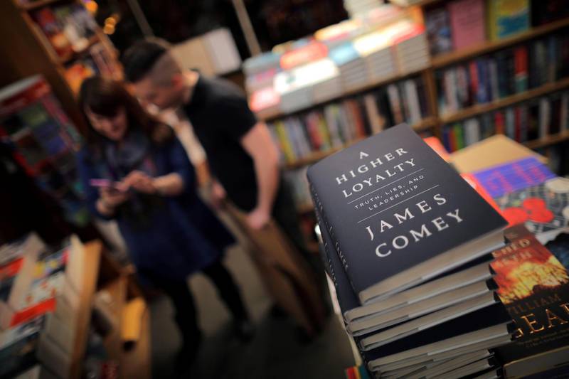 FILE PHOTO: Copies of former FBI director James Comey's book "A Higher Loyalty" are seen at Kramerbooks book store in Washington D.C., U.S. April 17, 2018.  REUTERS/Carlos Barria/File Photo