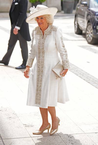 The Duchess of Cornwall wearing white coat dress. PA