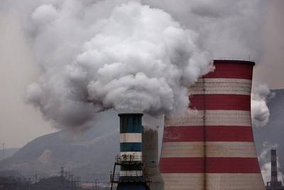 A coal-fired plant in China. Multilateral financial institutions are nudging countries undertaking energy transition to price their carbon emissions. Getty