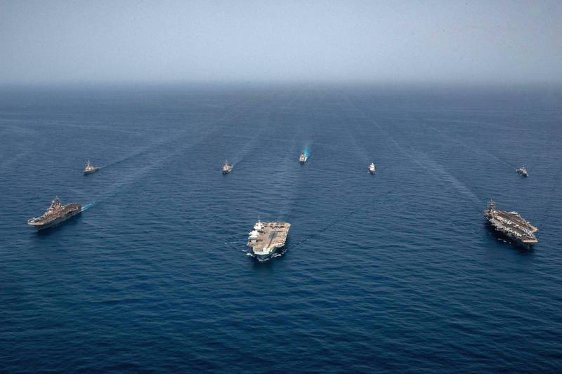 The US carrier strike group is in the Gulf region as Britain and its allies consider a response to Iran's deadly drone strike on a civilian ship. AFP