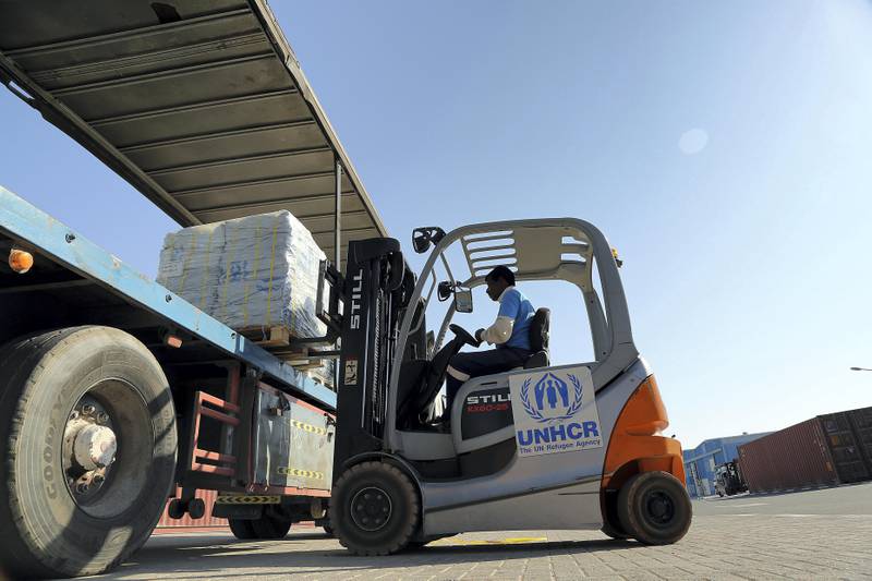 Dubai, 25,September,2017 : Workers loading the Humanitarian Aid from the UNHCR  warehouses to Bangladesh in support of Rohingya refugees from UNHCR office in Dubai. Satish Kumar / For the National / Story by Nick Webster
