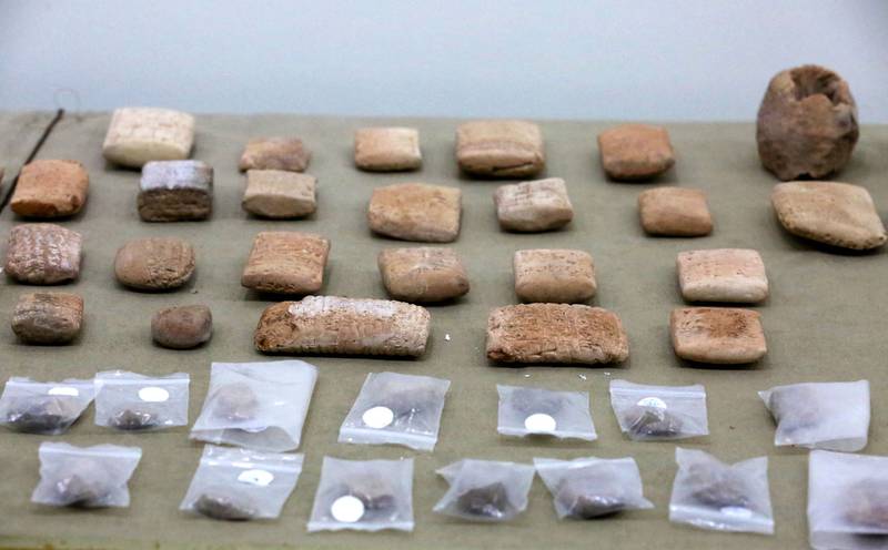 More than 300 ancient cuneiform writing tablets were returned to Iraq on Monday. AFP