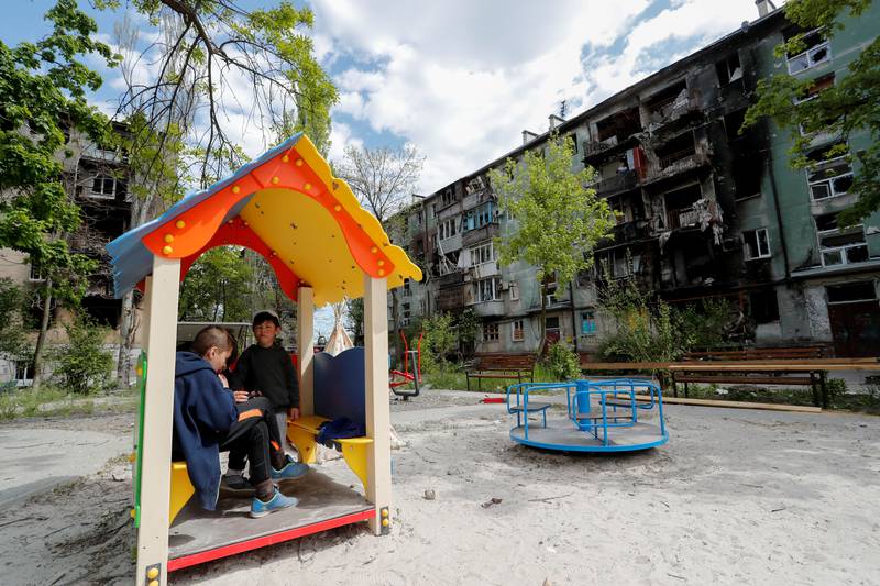 Children gather at a playground in Mariupol. Reuters