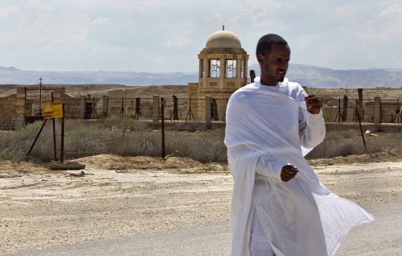 A Eritrean Christian worshipper is seen nearby the restricted Franciscan Church. Halo will be clearing the area of mines over the next 18 months.