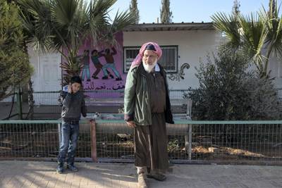 Mohamed Burhan with his son Razi at the school to the unrecognized village of al-Poraa near the city of Arad in the Negev Desert on February 2,2018. 
A future giant phosphate mine thats estimated to hold 65 million tons of phosphate, by theIsrael Chemicals subsidiary Rotem Amfert . Israel's Knesset is scheduled to discuss the plan which a committee of ministers have already approved, despite that the area is populated by Bedouins that fear it  will cause serious health risks and most likely evict them from their homes. (Photo by Heidi Levine for The National).
