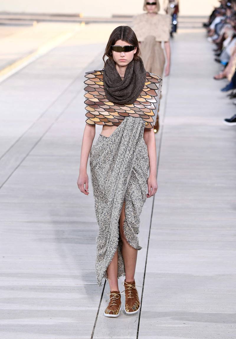 Scales resembling chain mail at the Louis Vuitton cruise 2023 show. AFP