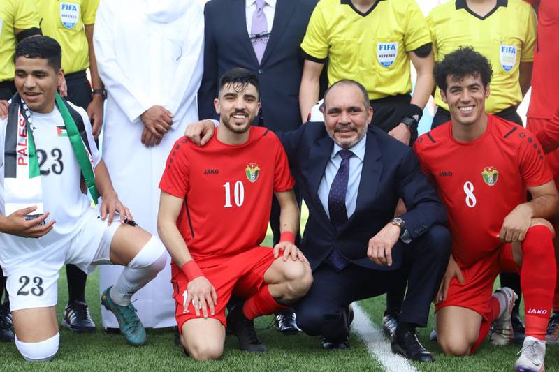 Prince Ali bin Al Hussein with footballers from Jordan and Palestine's under-23 squads. Prince Ali bin Al Hussein / Twitter