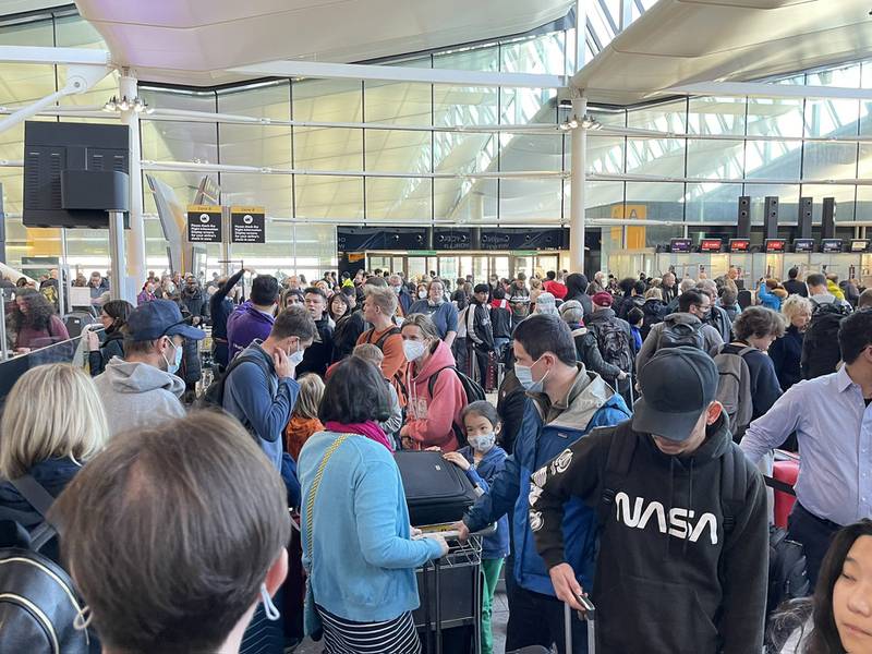 Passengers queue to check in at Heathrow Airport's Terminal 2 on Friday morning. Photo: Twitter