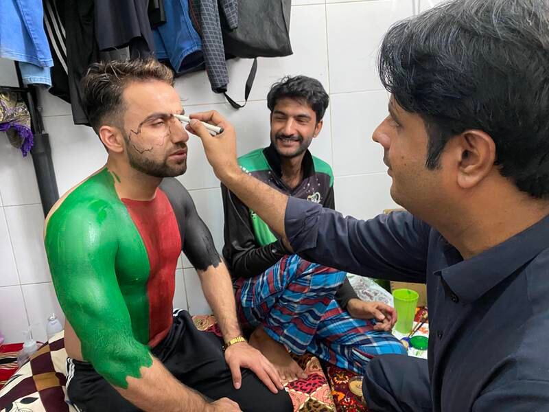 Rahim Sediqi chose the Afghan tricolour for the image on his chest. Paul Radley / The National