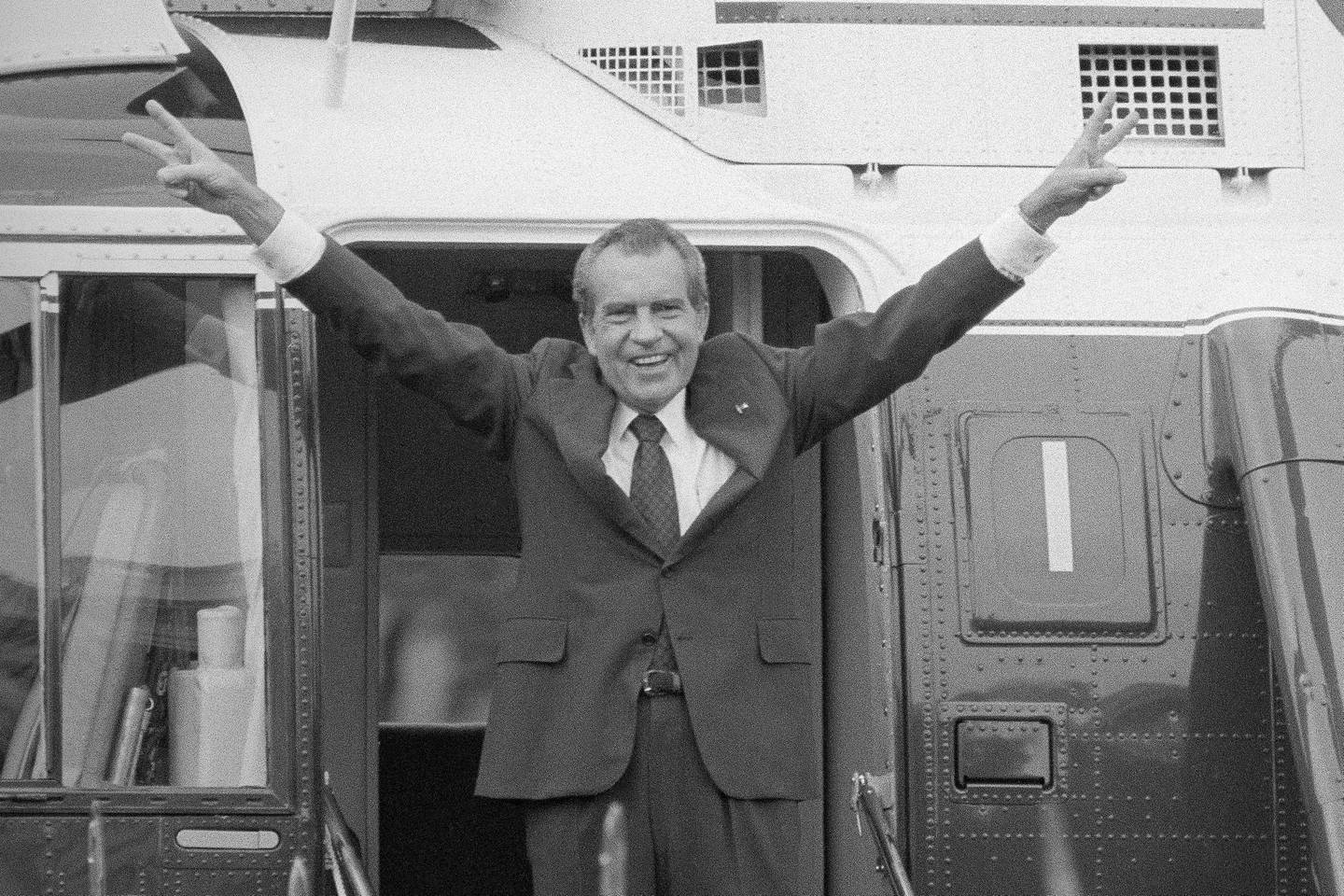 Richard Nixon says goodbye to the White House staff as he boards a helicopter after resigning as US President, August 9, 1974. AP