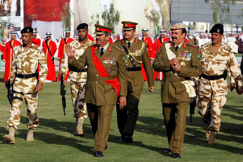 Military Chief Field Marshal Shaikh Khalifa bin Ahmed al-Khalifa (L) and Sheikh Daij bin Salman al-Khalifa (R) inspect the venue of the inauguration ceremony of the King Hamad hospital in Muharraq, north of Manama February 6, 2012. Bahrain inaugurated its third public hospital, which provides free medical services and treatment to both local and foreign residents. REUTERS/Hamad I Mohammed (BAHRAIN - Tags: POLITICS HEALTH MILITARY) - GM1E82708AN01