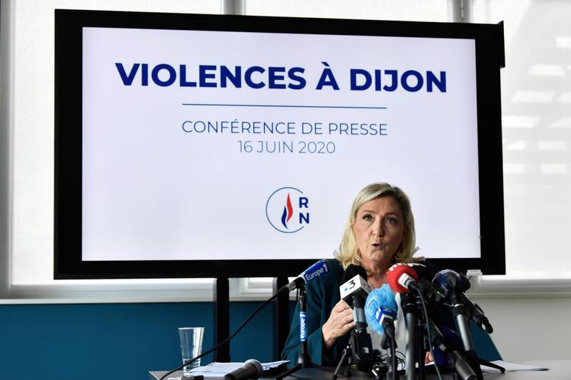 French far-right Rassemblement National (RN) party President Marine Le Pen gives a press conference on June 16, 2020, in Dijon, eastern France, after four consecutive nights of unrest in the city linked to score-settling by members of the Chechen community. The usually placid eastern city of Dijon has been hit by a fourth night of unrest of which the incidents, according to police, appear to have been sparked by an assault earlier in the month on a 16-year-old Chechen boy, prompting other members of the community to stage reprisal raids. Chechens reportedly had travelled to Dijon from all over France and even from neighbouring Belgium and Germany. Their actions have focused on the low-income district of Gresilles which has a large community of people originally from North Africa.
 / AFP / PHILIPPE DESMAZES
