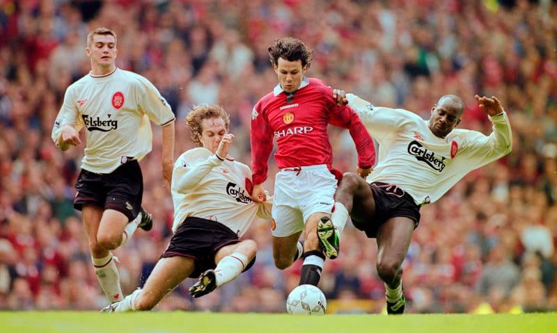 Giggs glides past Liverpool defenders during a Premier League clash in October 1996. Getty Images