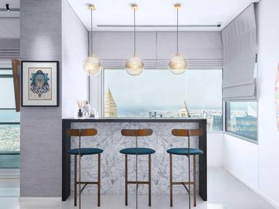 A sleek bar area with skyline views. Courtesy Luxhabitat Sotheby's International Realty