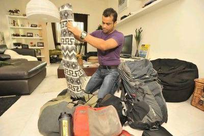 Girish Shivanand packs his bag before heading off on his fourth Gulf For Good challenge.
