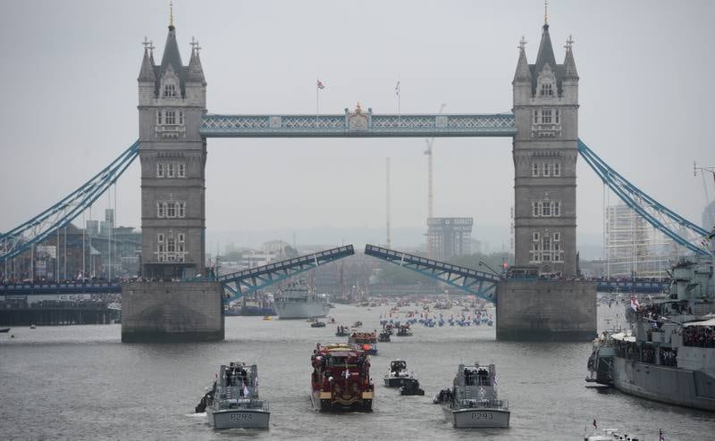 The queen's barge 'Spirit of Chartwell' passes under Tower Bridge in London, as part of her diamond jubilee Pageant on the River Thames.