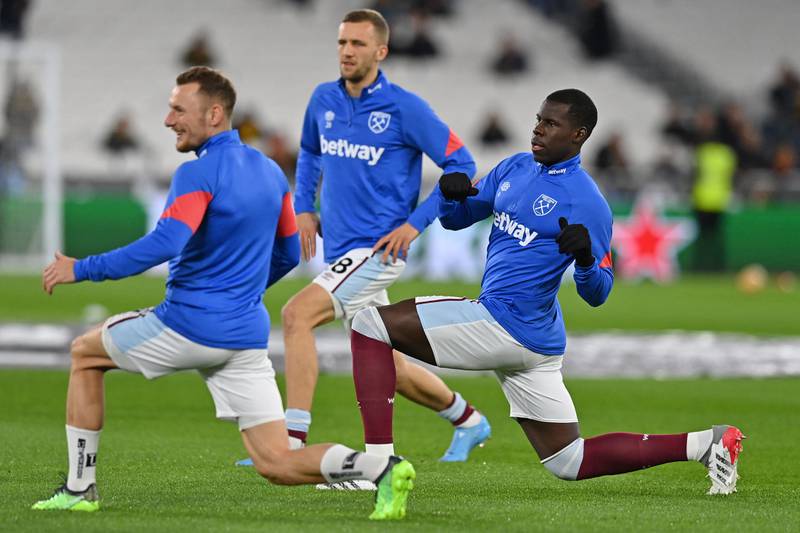 Kurt Zouma warms up ahead of the game between West Ham and Watford. AFP
