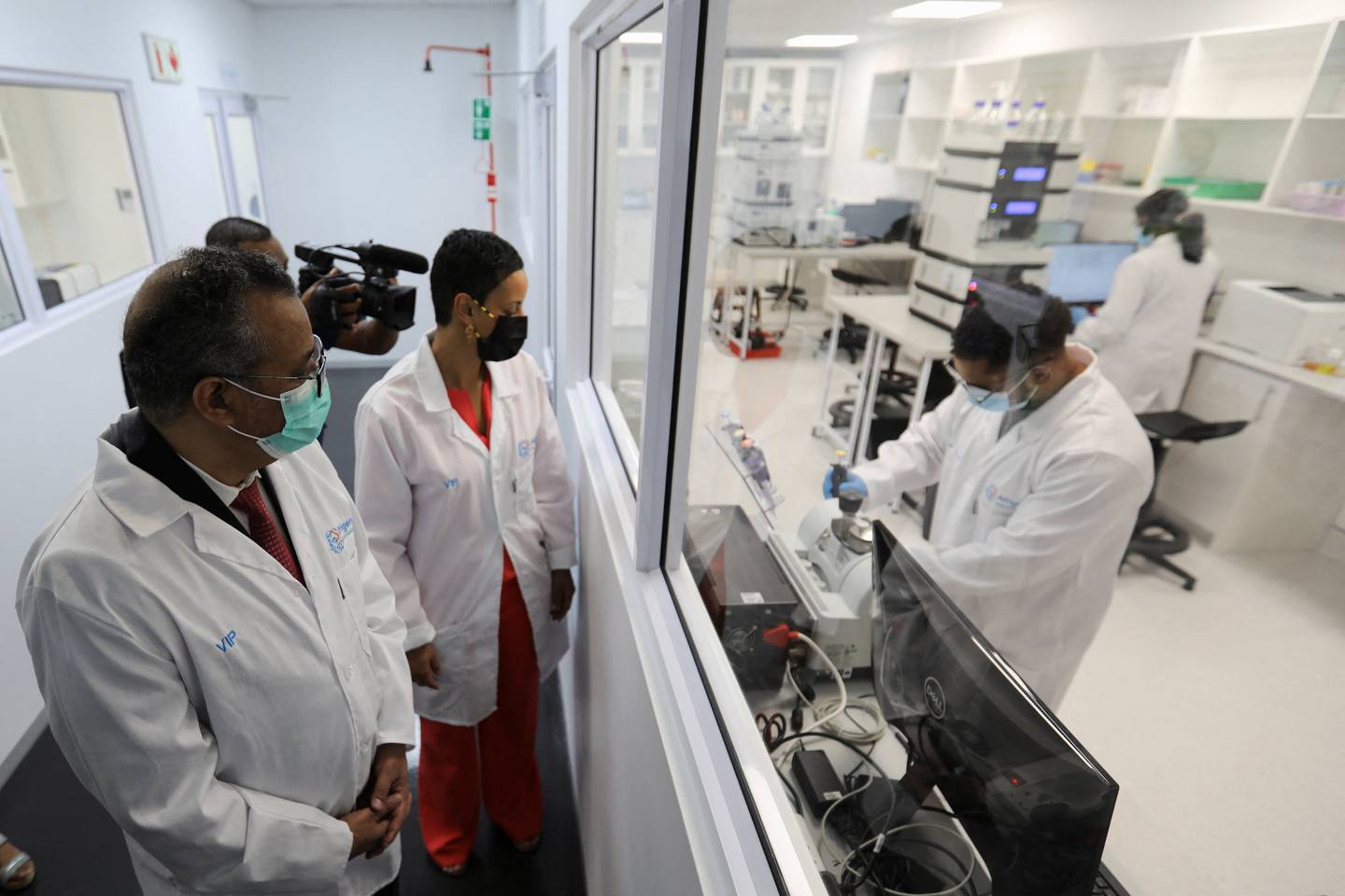 Tedros Adhanom Ghebreyesus and Belgium's Minister of Development Cooperation Meryame Kitir visit a WHO-backed mRNA vaccine hub in Cape Town, South Africa.