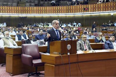 Pakistan's Prime Minister Shehbaz Sharif addresses the last session of the current parliament on Wednesday. Press Information Department via AP
