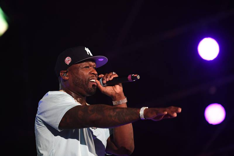 US rapper 50 Cent performs on stage during the Jeddah World music Festival on July 18, 2019, at the King Abdullah Sports City in the coastal city of Jeddah. US Pop icon Janet Jackson and US rapper 50 Cent are among musicians set to perform in Saudi Arabia, organisers said, after US rapper Nicki Minaj pulled out in a show of support for women's rights. / AFP / AMER HILABI
