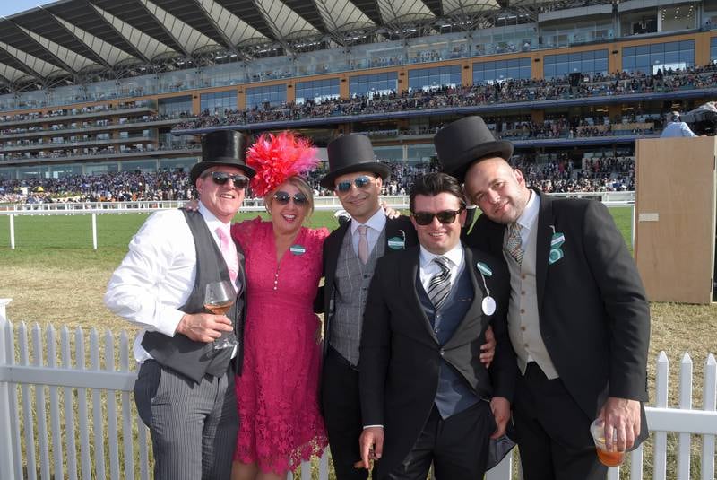 Racegoers pose in the Village Enclosure during Royal Ascot.  Getty Images