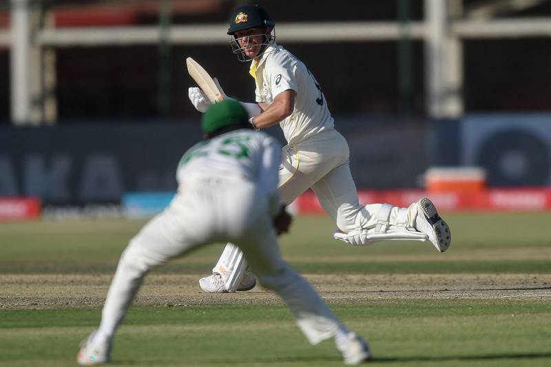 Australia opener David Warner watches his shot land in the hands of Pakistan's Fawad Alam. AFP