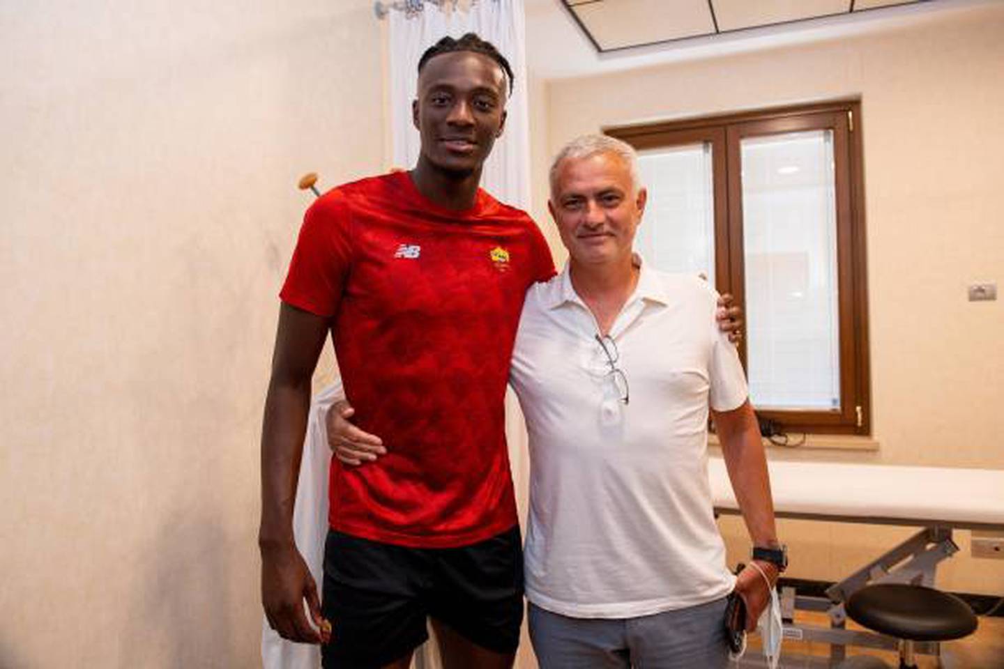 Tammy Abraham with manager Jose Mourinho after signing for Roma. Getty