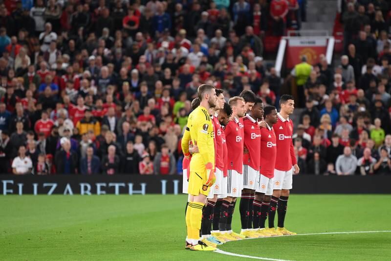 Players of Manchester United observe a minute's silence after the death of Queen Elizabeth II  prior to the Europa League match against Real Sociedad at Old Trafford on September 8, 2022. Getty