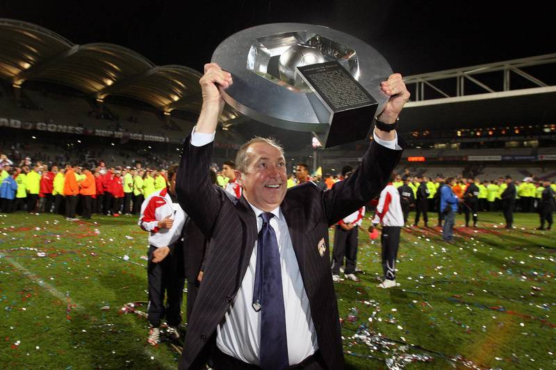 In this file photo taken on May 27, 2007 Lyon's coach Gerard Houllier holds the Ligue 1 title. AFP