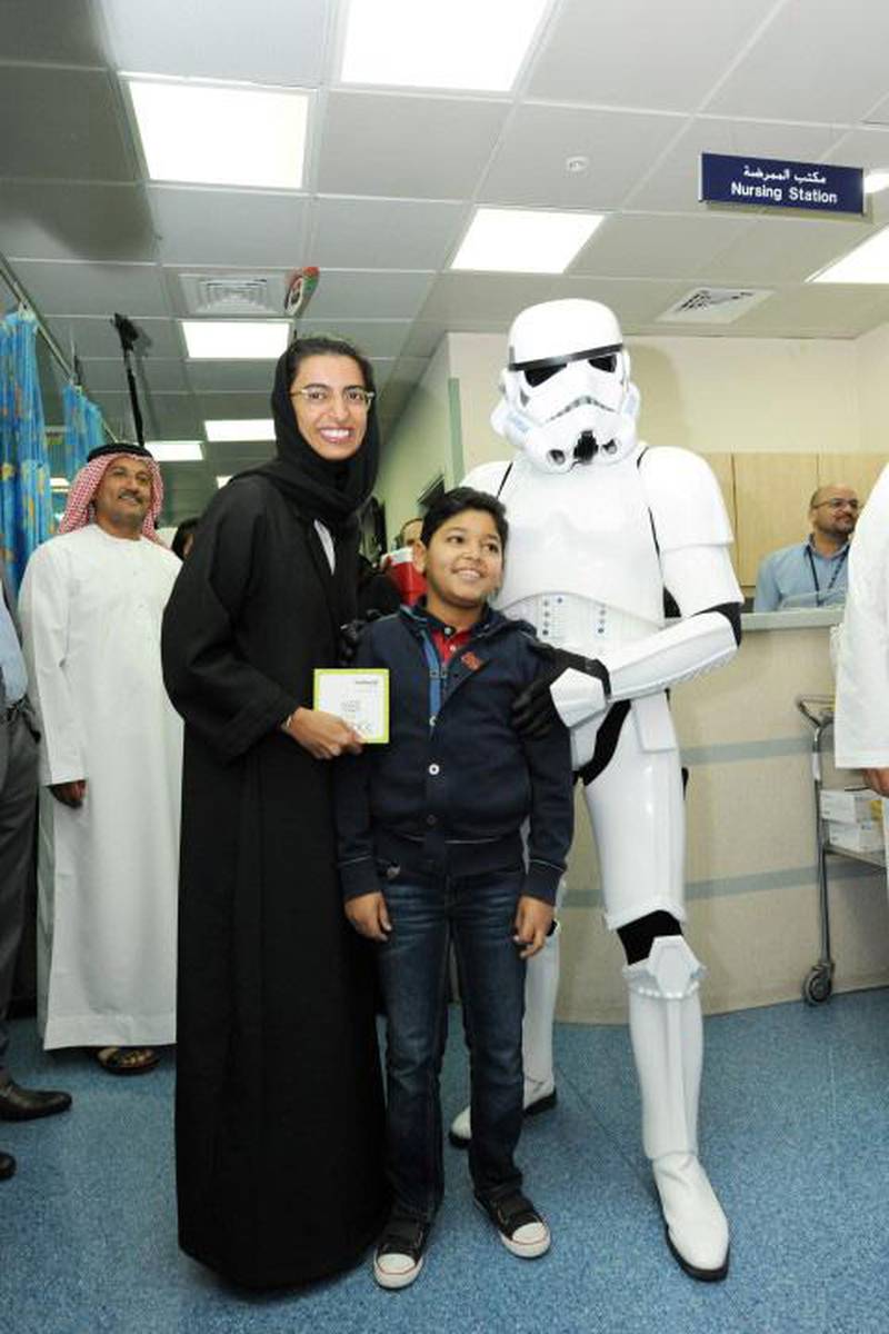Twofour54 CEO Noura Al Kaabi and three Star Wars Stormtroopers paid a visit to children at Sheikh Khalifa Medical City in Abu Dhabi. Courtesy of twofour54  *** Local Caption ***  al99-S&H-stormtroopers01.jpg