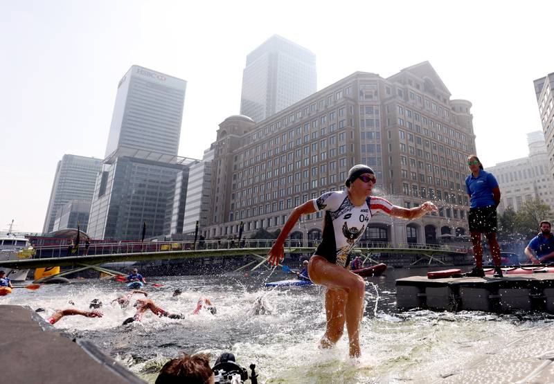 British athlete Jessica Learmonth at the end of the swimming leg during the Super League Triathlon Championship 2021 in Canary Wharf, London, on Sunday September 5. PA